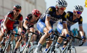 India A land Of Incredible Diversity, Competitive cyclists in a high-speed race, showcasing athleticism and teamwork.